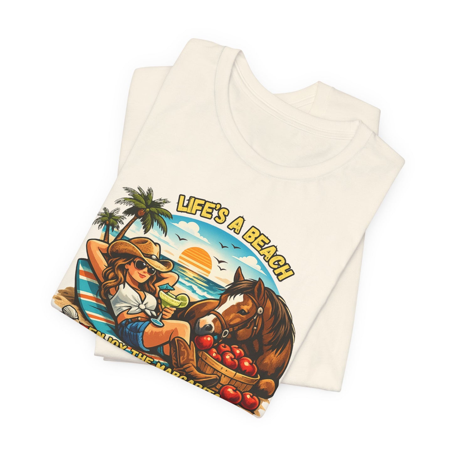 Life's A Beach Western Tee featuring a cowgirl, sunset, and horse, perfect for casual summer wear.