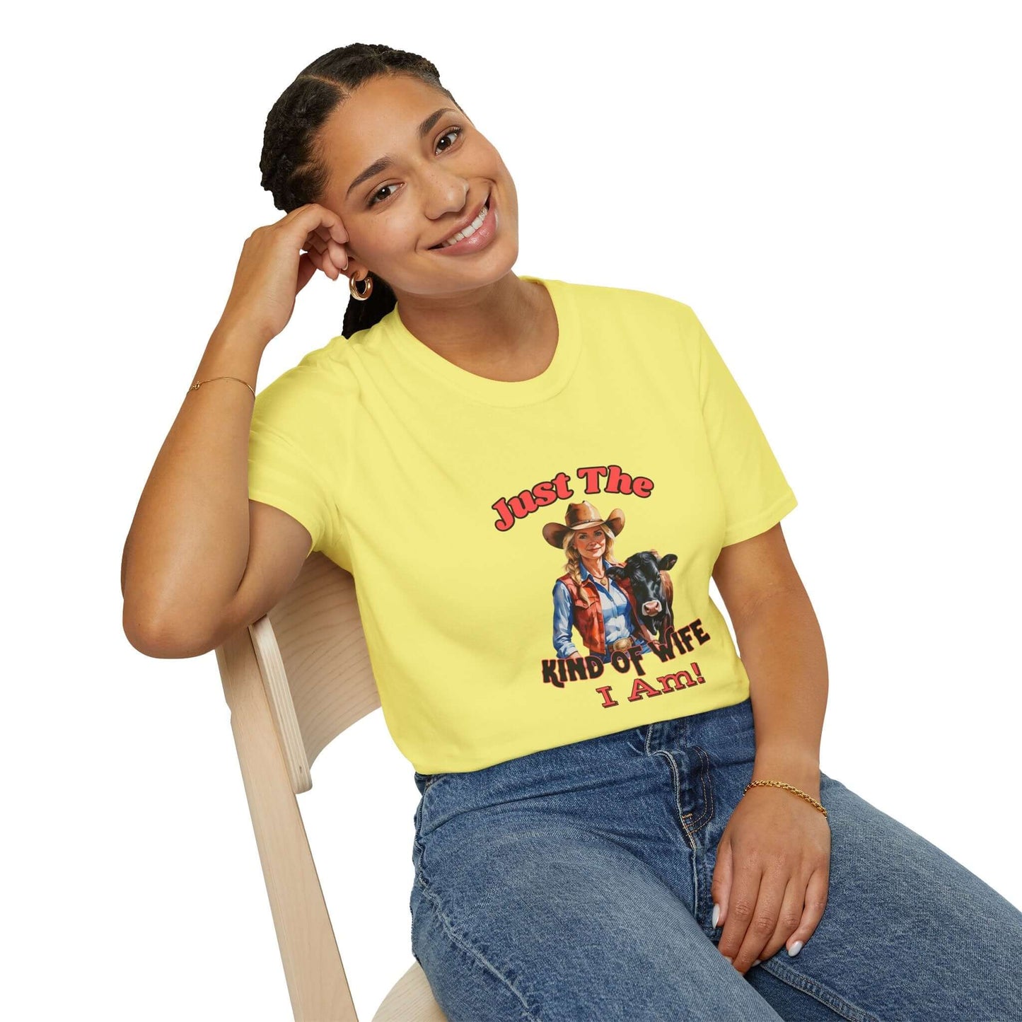Woman wearing a Funny Farm Wife Shirt that says 'Just the Kinda of Wife I Am' in bright yellow.