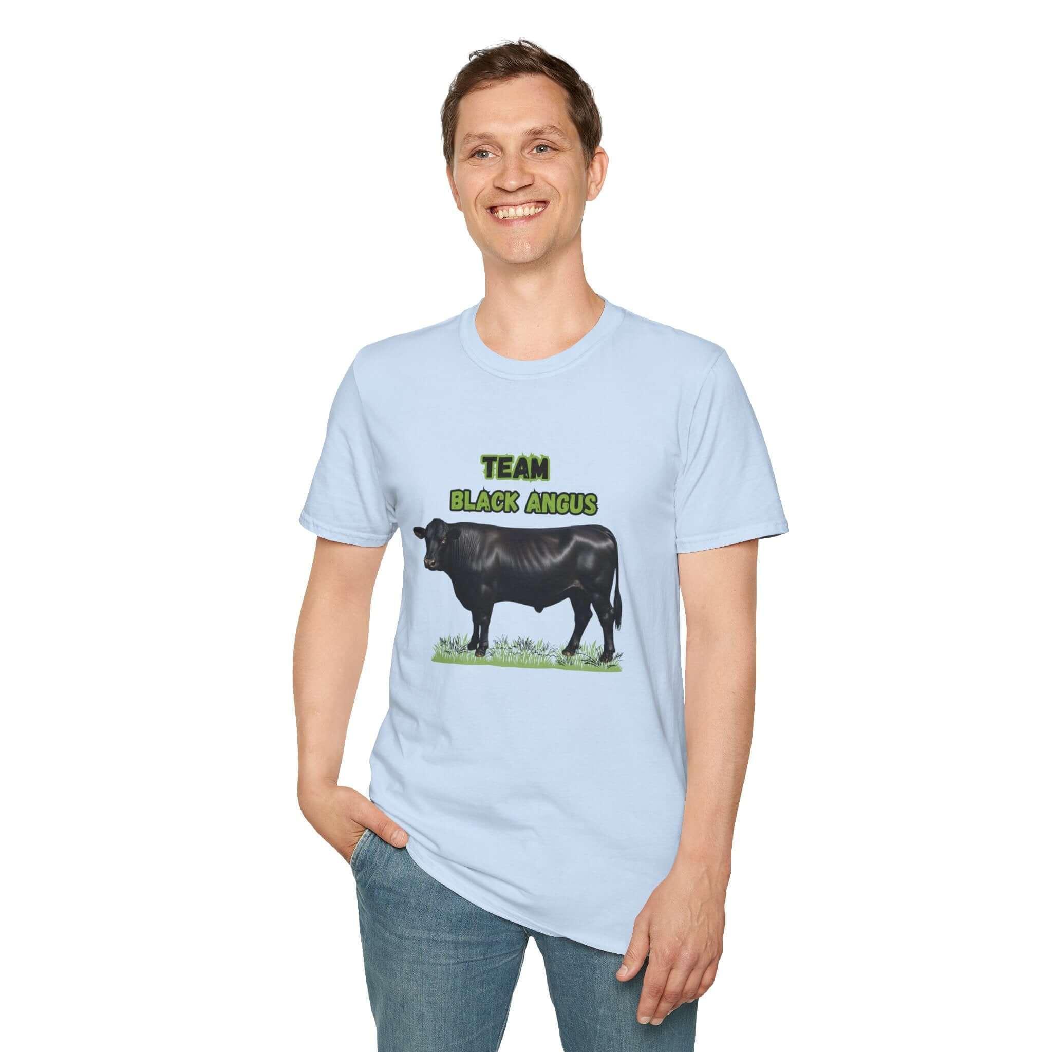 Man wearing a light blue Black Angus Lover T-Shirt with a cow graphic, perfect for ranchers and farmers.