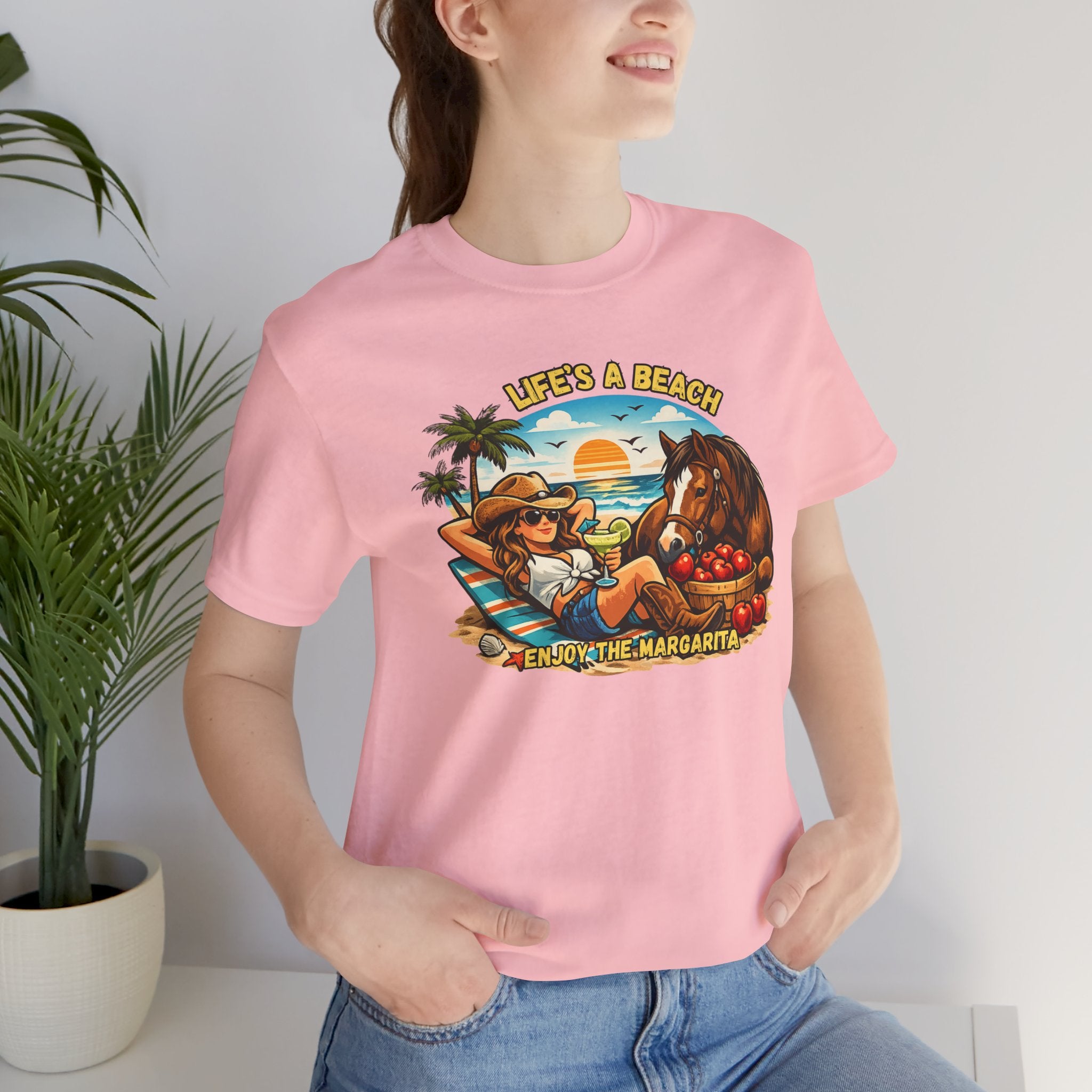 Life's A Beach Western Tee featuring a cowgirl relaxing with a horse and tropical fruit, perfect for beach lovers.