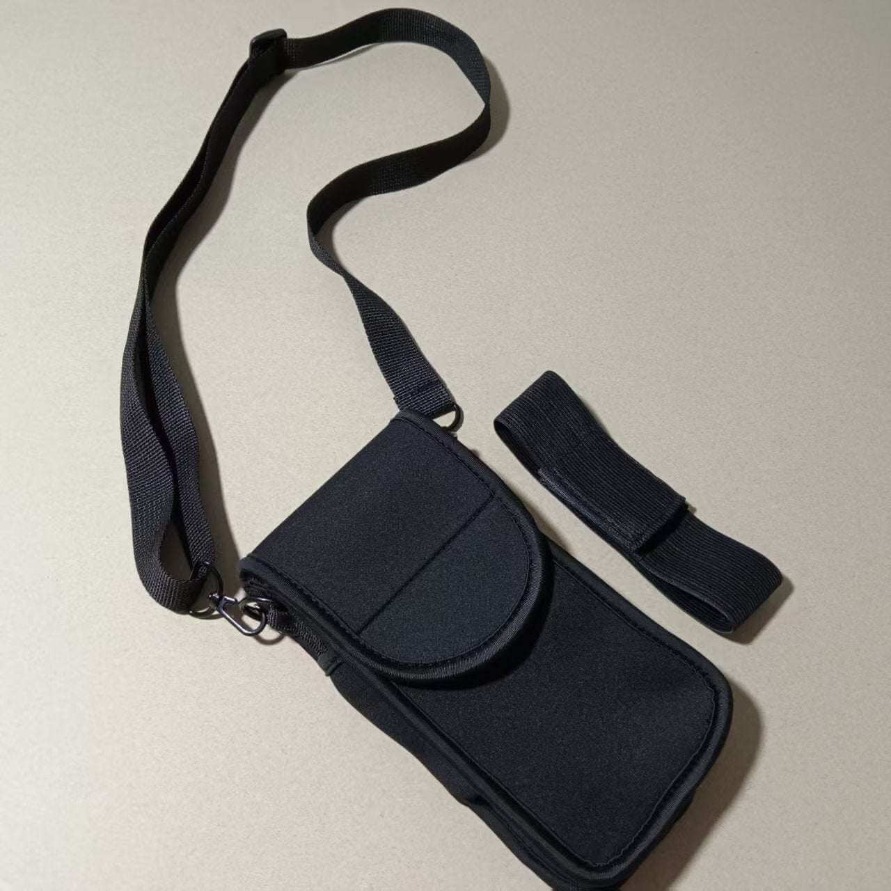 Cell Phone Holster - Tactical phone holder for riding with adjustable strap and secure closure.