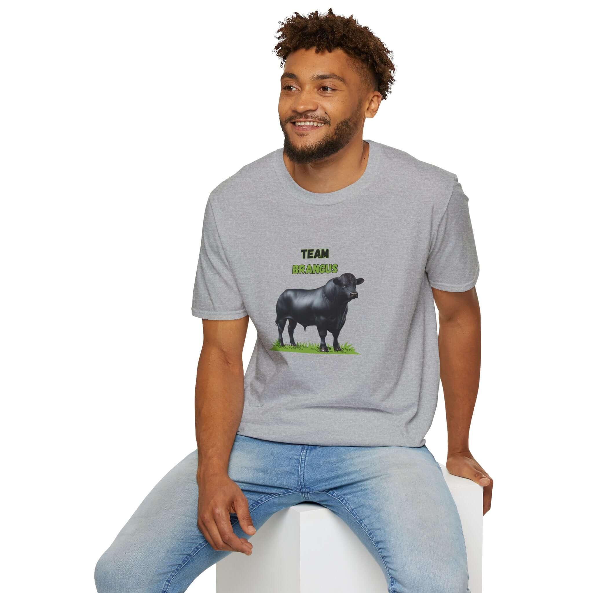 Man wearing a gray Brangus Cattle farmer tee with Team Brangus print, showcasing cattle pride.