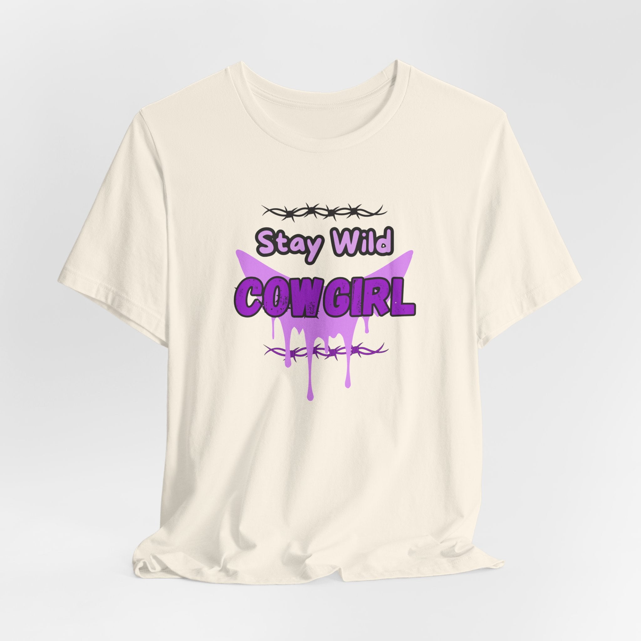 Cowgirl Western Tee featuring "Stay Wild COWGIRL" graphic on a lightweight cream shirt.