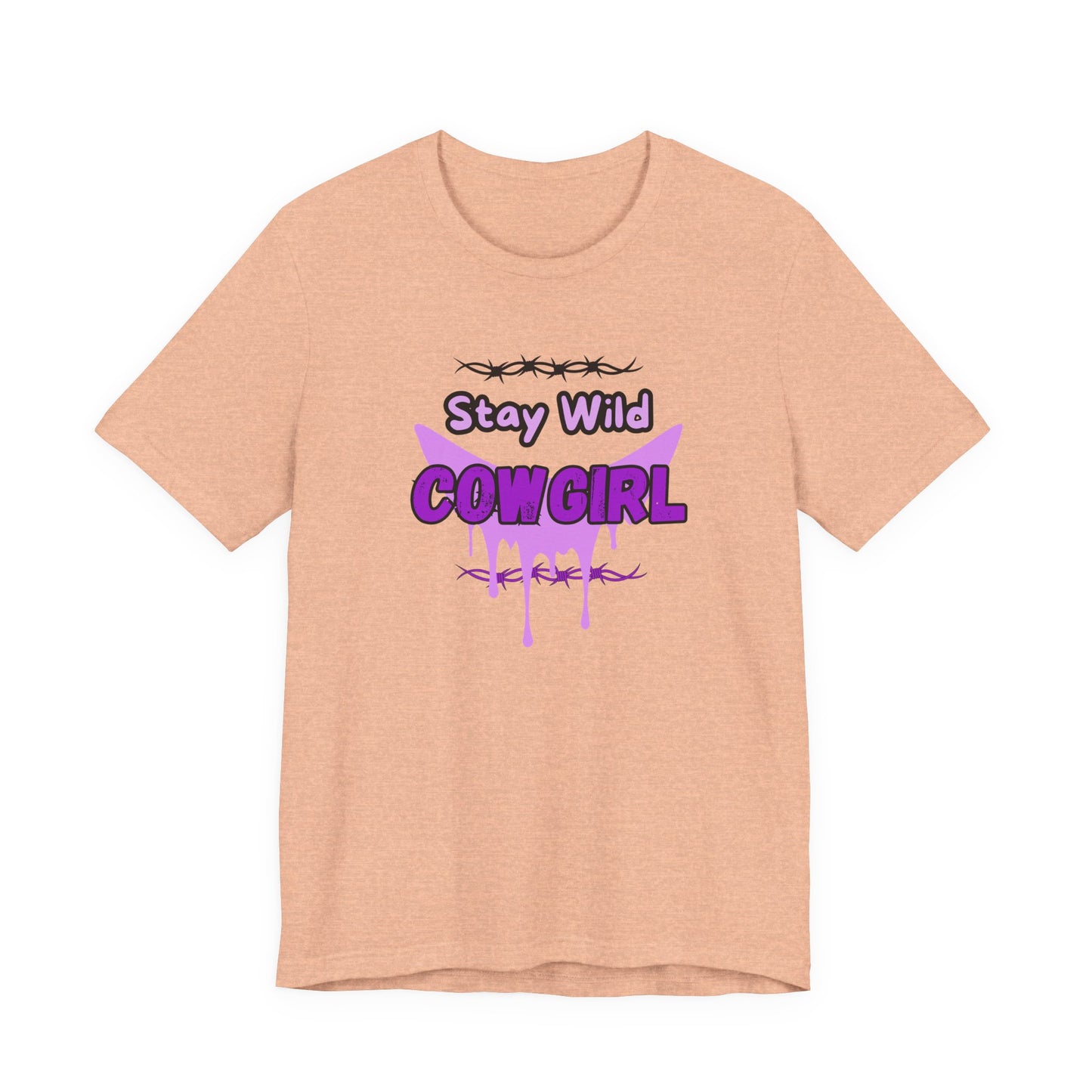 Cowgirl Western Tee with playful 'Stay Wild COWGIRL' graphic in purple on a light peach background.