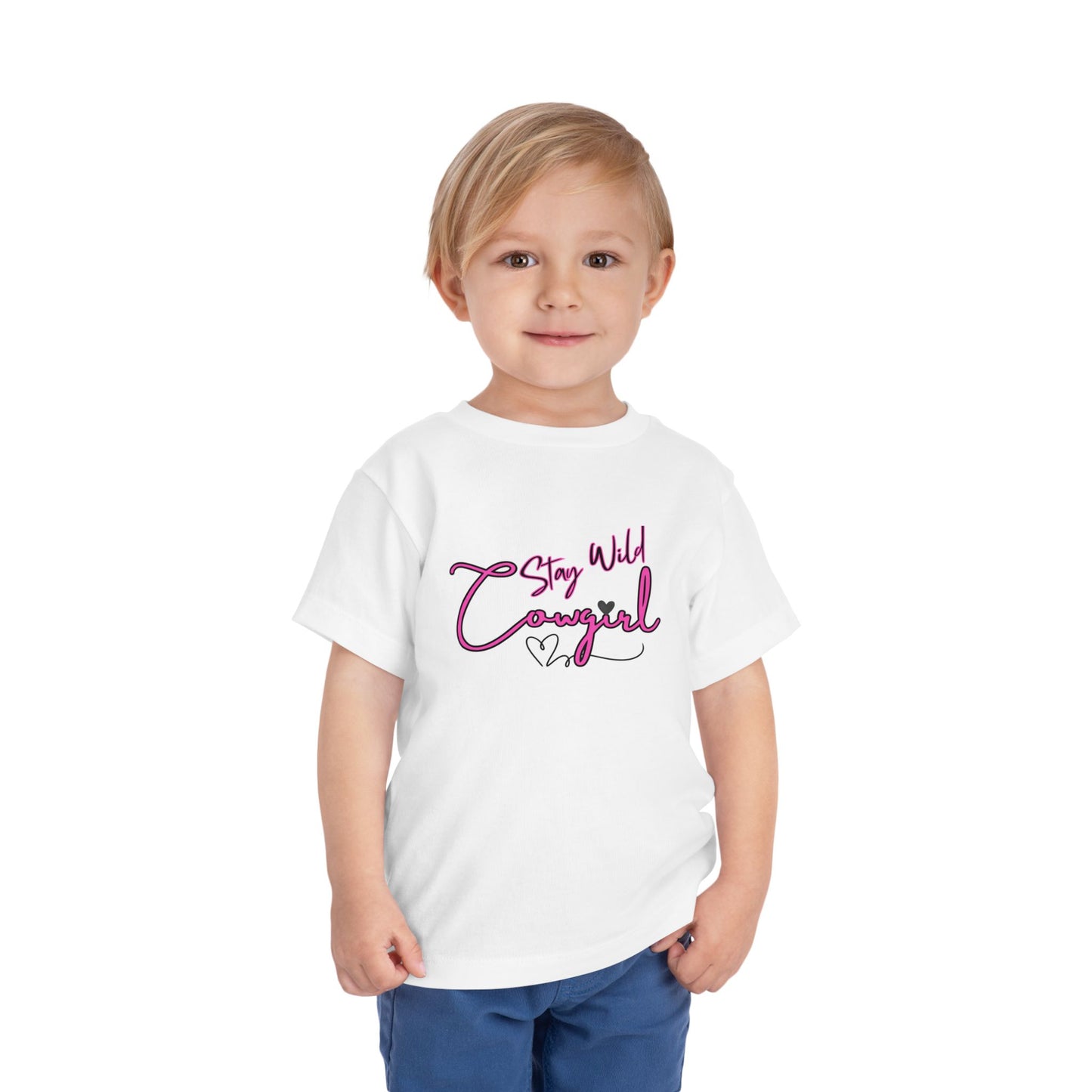 Toddler Cowgirl Tee featuring playful 'Stay Wild Cowgirl' design on a young child wearing a soft white shirt.