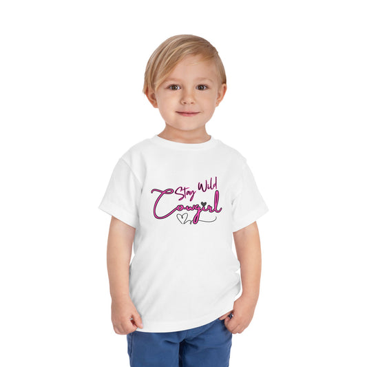 Toddler Cowgirl Tee featuring playful 'Stay Wild Cowgirl' design on a young child wearing a soft white shirt.