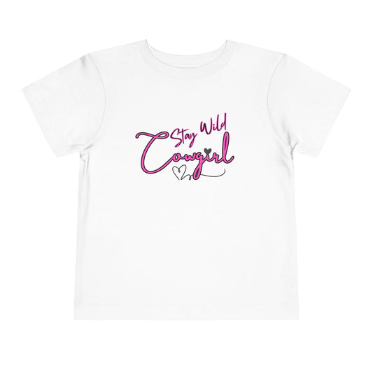 Toddler Cowgirl Tee featuring playful hand-lettered 'Stay Wild Cowgirl' design on a soft white shirt.