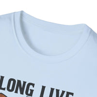  Woman wearing Long Live the Cowgirl horseshoe graphic t-shirt, showcasing cowgirl apparel with a relaxed smile.