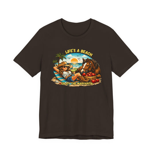 Life's A Beach Western Tee featuring a cowgirl, horse, and sunset design, perfect for casual beach wear.