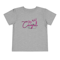Toddler Cowgirl Tee featuring a playful design with 'Stay Wild Cowgirl' in vibrant colors on a gray background.