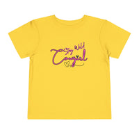 Toddler Cowgirl Tee in bright yellow with playful 'Stay Wild Cowgirl' design, perfect for active little ones.