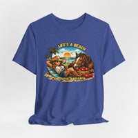 Life's A Beach Western Tee featuring a cowgirl relaxing with a horse and tropical elements, perfect for casual wear.