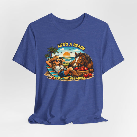 Life's A Beach Western Tee featuring a cowgirl relaxing with a horse and tropical elements, perfect for casual wear.