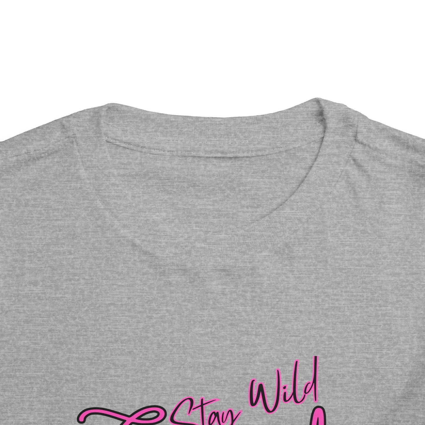 Toddler Cowgirl Tee showing soft fabric and playful 'Stay Wild Cowgirl' design for children apparel.