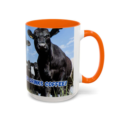 Black Angus Coffee Mug featuring a black Angus cow and the phrase 'Rancher drinks coffee' with an orange handle.