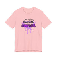 Cowgirl Western Tee with Stay Wild COWGIRL graphic on a pink t-shirt, showcasing a playful cowgirl vibe.