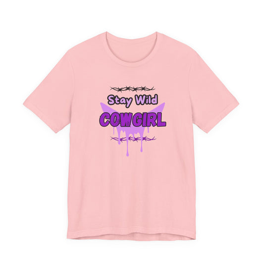 Cowgirl Western Tee with Stay Wild COWGIRL graphic on a pink t-shirt, showcasing a playful cowgirl vibe.