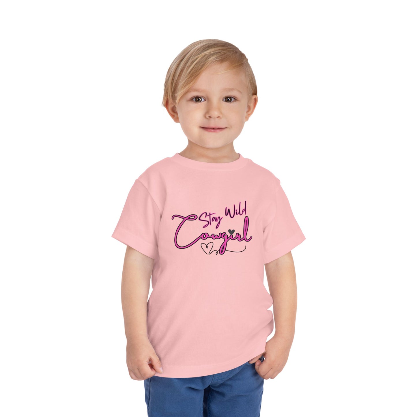 Toddler Cowgirl Tee featuring a playful design reading 'Stay Wild Cowgirl' on a young child.