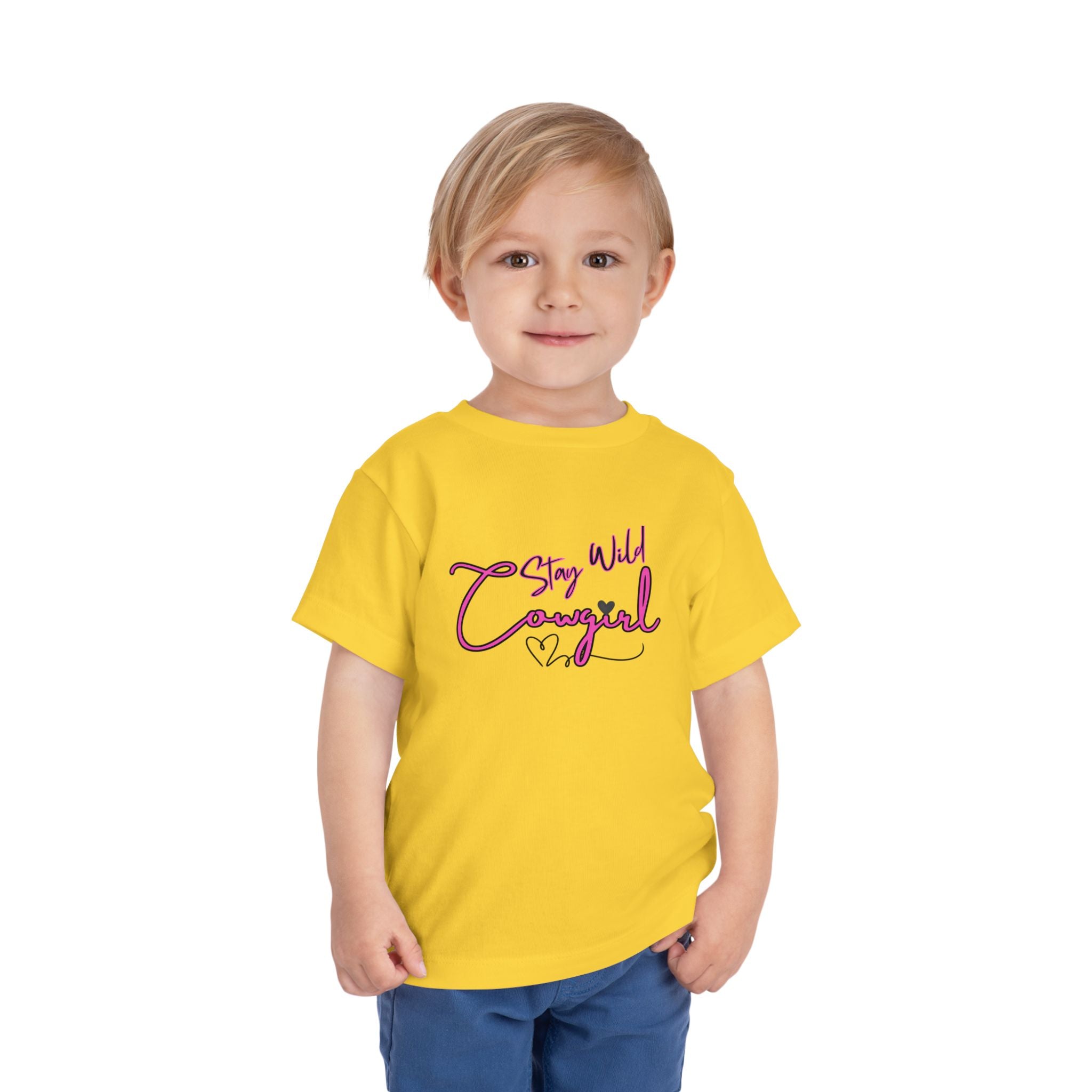 Toddler Cowgirl Tee in yellow with playful 'Stay Wild Cowgirl' design, perfect children apparel for adventures.