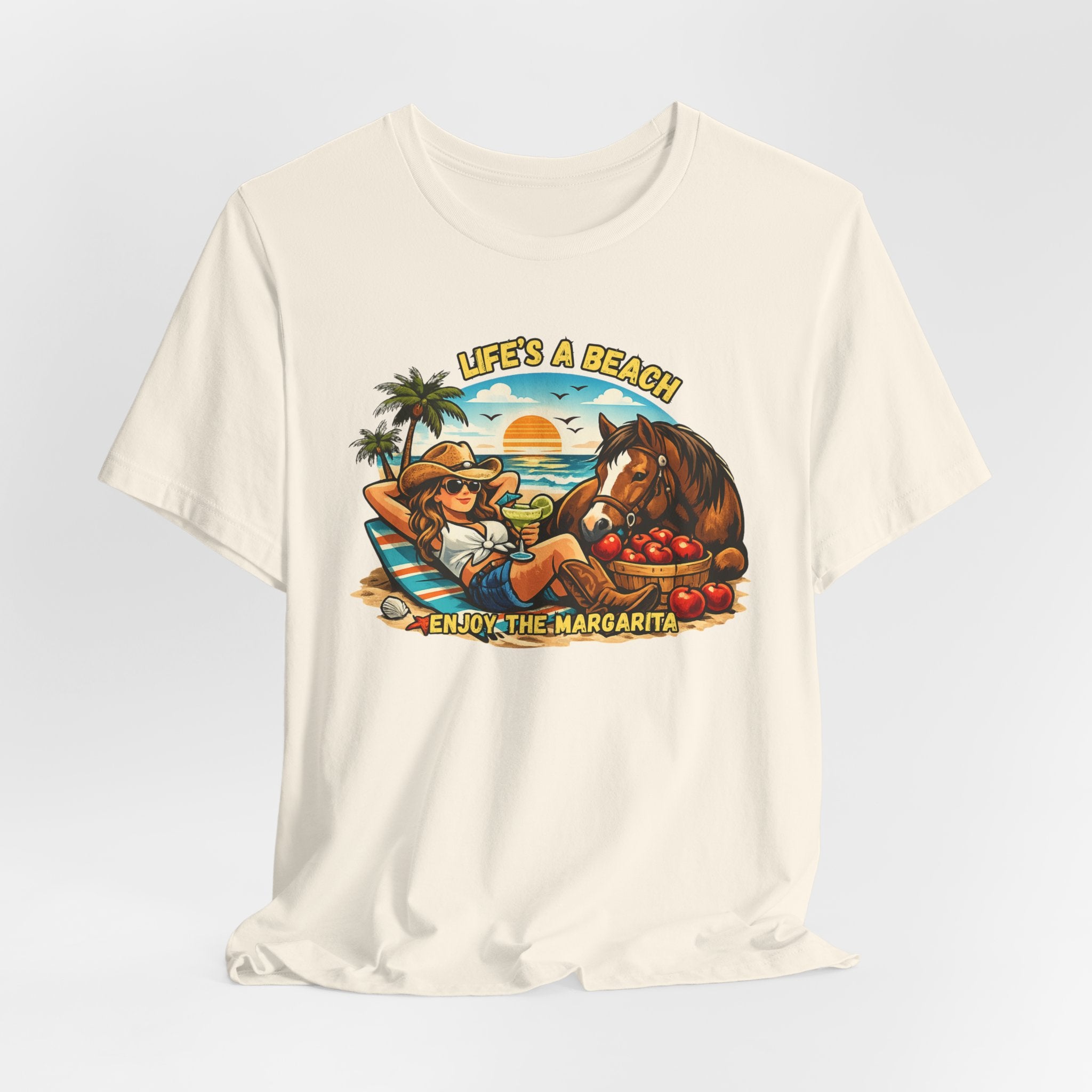 Life's A Beach Western Tee featuring a girl enjoying a margarita with a horse, palm trees, and sunset in a fun design.