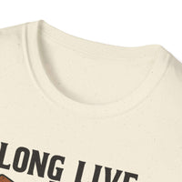  Woman wearing Long Live the Cowgirl horseshoe graphic t-shirt, showcasing cowgirl apparel with a relaxed smile.