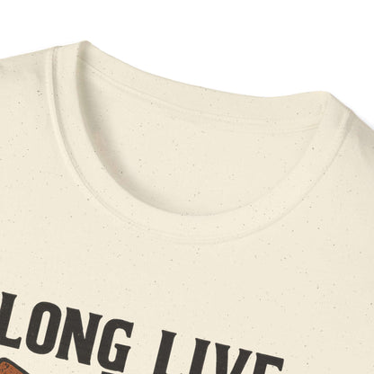  Woman wearing Long Live the Cowgirl horseshoe graphic t-shirt, showcasing cowgirl apparel with a relaxed smile.