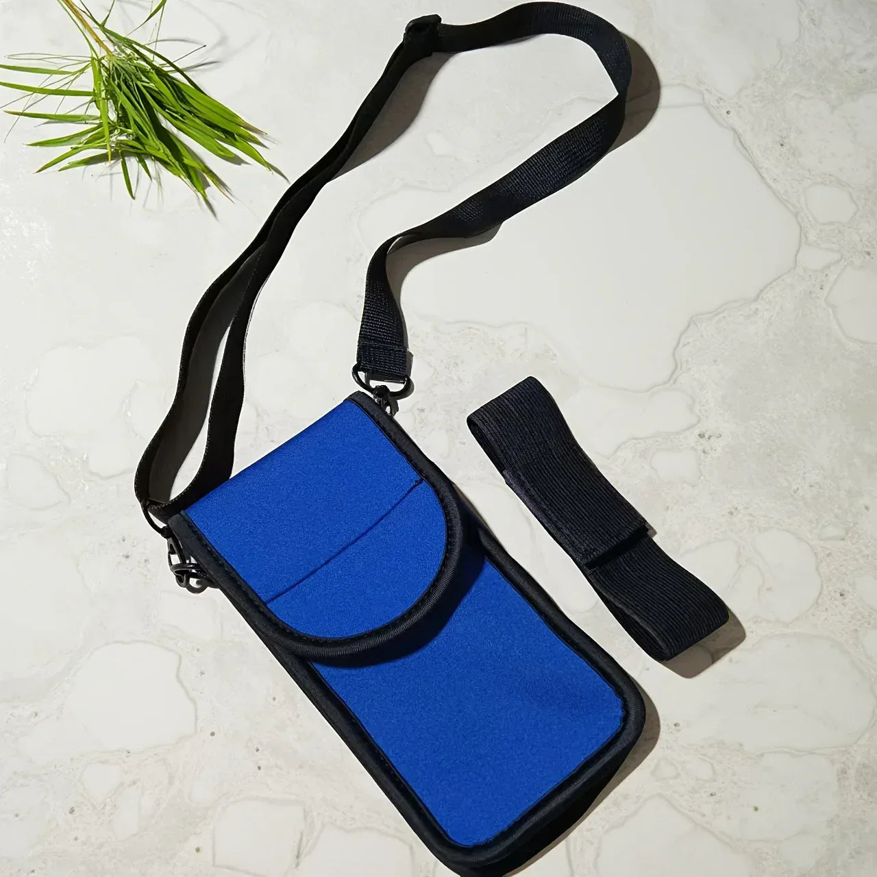 Cell Phone Holster in blue with adjustable strap and secure closure, ideal for riding and outdoor activities.